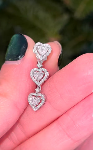 White gold diamond heart shaped dangling earrings natural