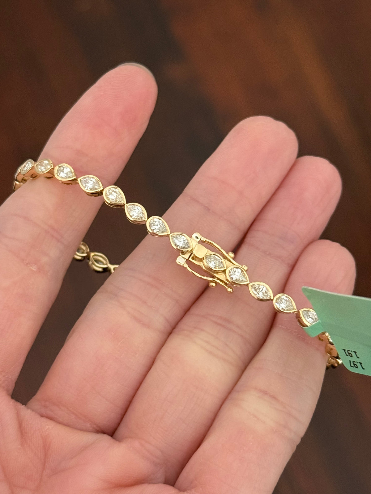 Yellow gold bezel set 3.88ct marquise and pear shape natural diamond bracelet
