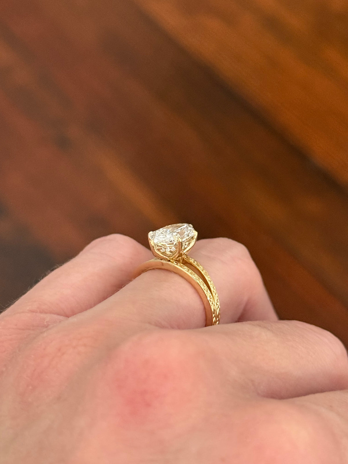 Yellow gold 2.6ct duchess cut lab diamond and round lab diamond ring. Duchess cut measures 13.3x6.59mm