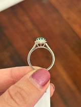 White gold heart shaped lab emerald and round lab diamond ring