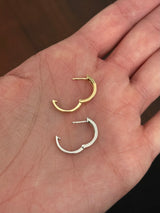 14.3mm hoop earrings available in yellow gold with rubies and white gold with emeralds