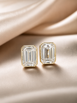 IGI 2.54ct + 2.54ct Emerald Cut Bezel Stud in Yellow Gold