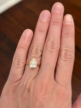 Yellow gold bezel set 1.96ct pear shaped lab diamond ring
