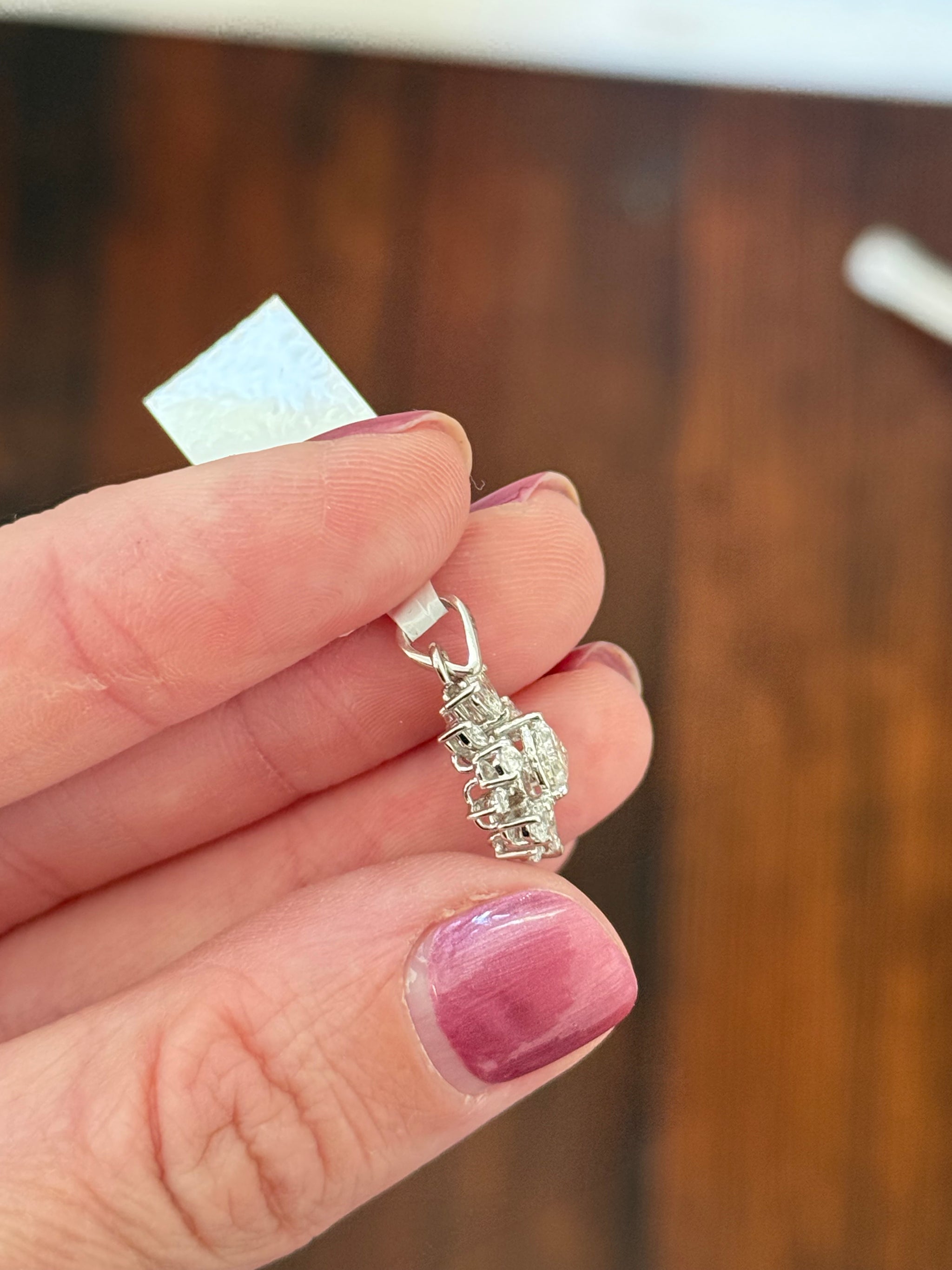 White gold trillion, pear shape and marquise lab diamond pendant. Center stone measures 5.1x5.5mm