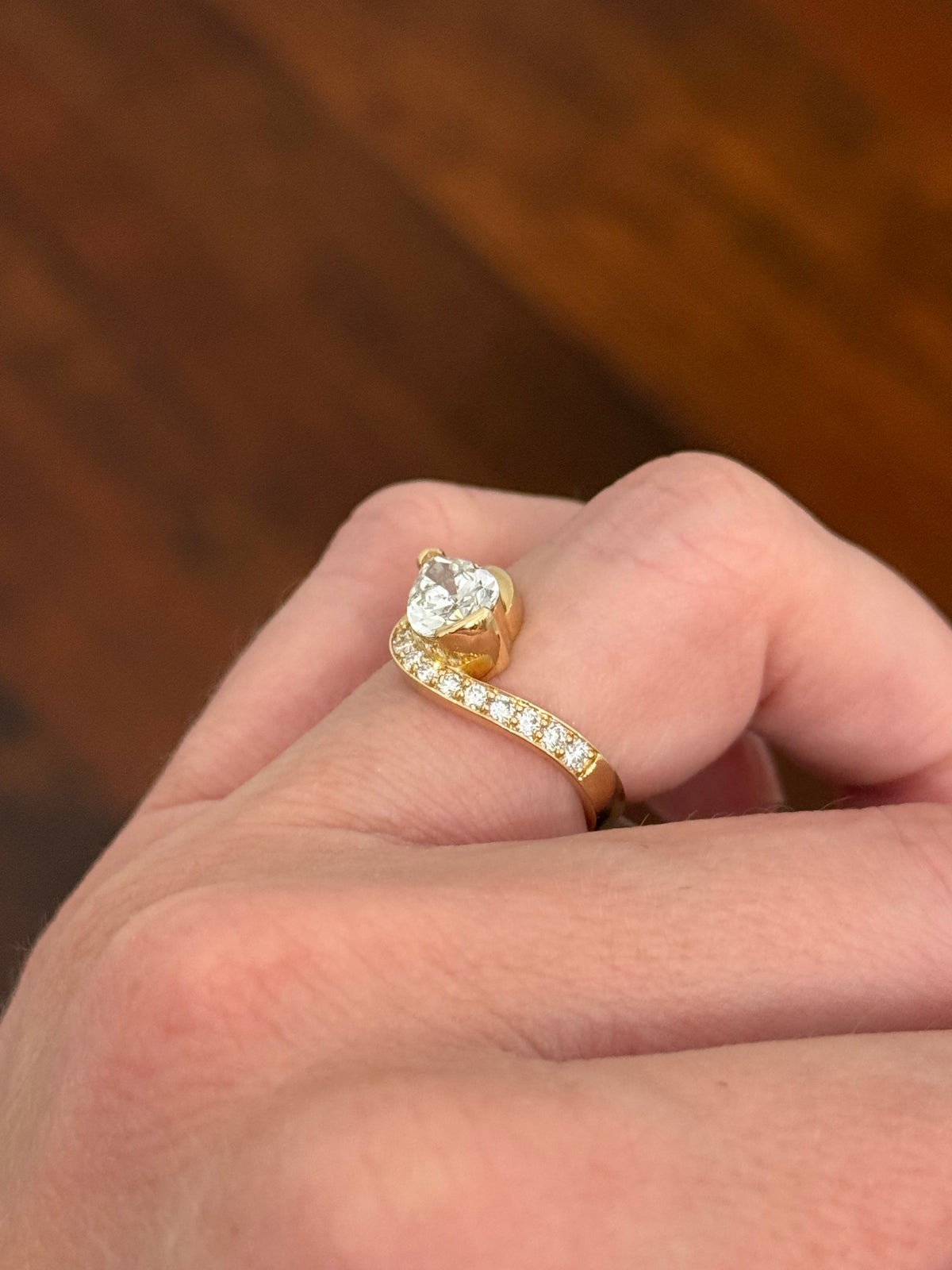 Yellow gold pear shape and round lab diamond ring. Pear shape is IGI certified and 1.54cts E VS1