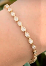 Yellow gold bezel set 3.88ct marquise and pear shape natural diamond bracelet