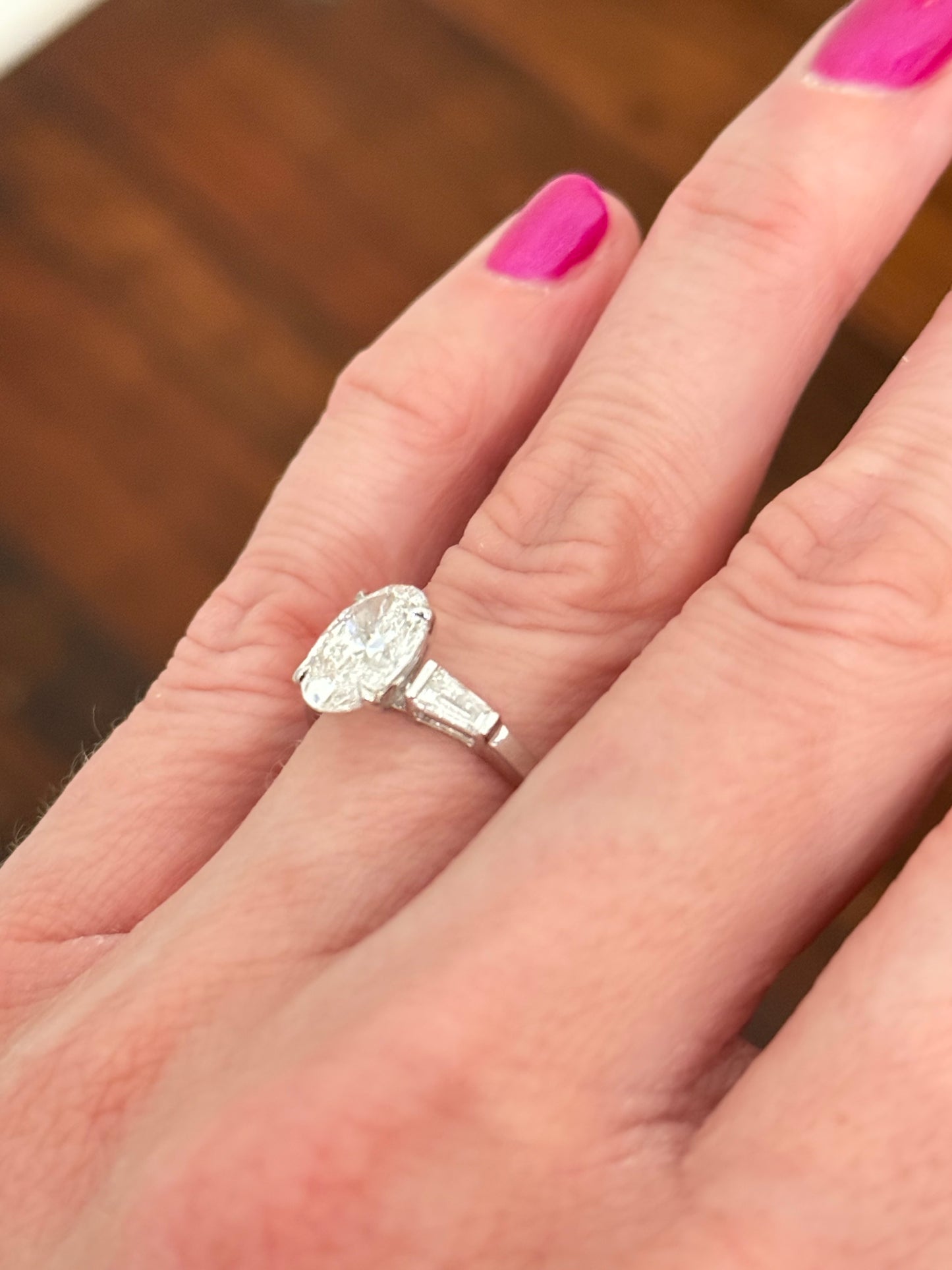 White gold IGI certified 2ct oval and tapered baguette lab diamond ring