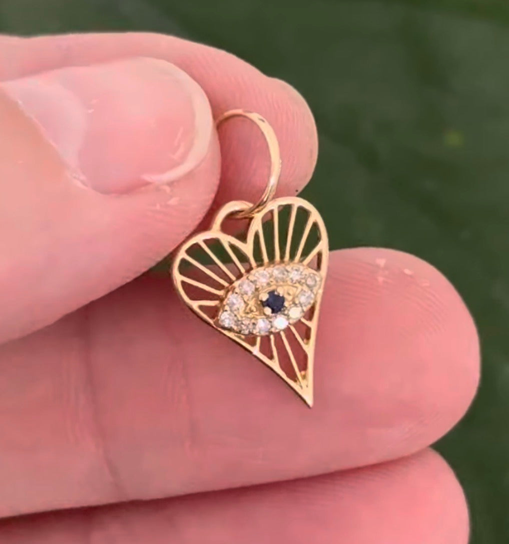 Yellow gold natural diamond and sapphire evil eye heart pendant