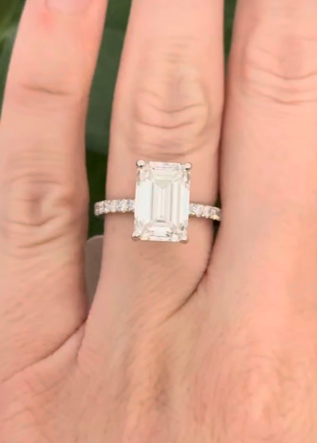 IGI certified emerald cut and round lab diamond ring. Center stone is 5.06cts