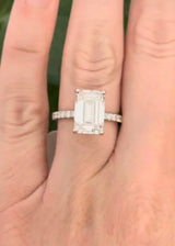 IGI certified emerald cut and round lab diamond ring. Center stone is 5.06cts