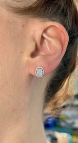 White gold oval cluster studs with round diamonds