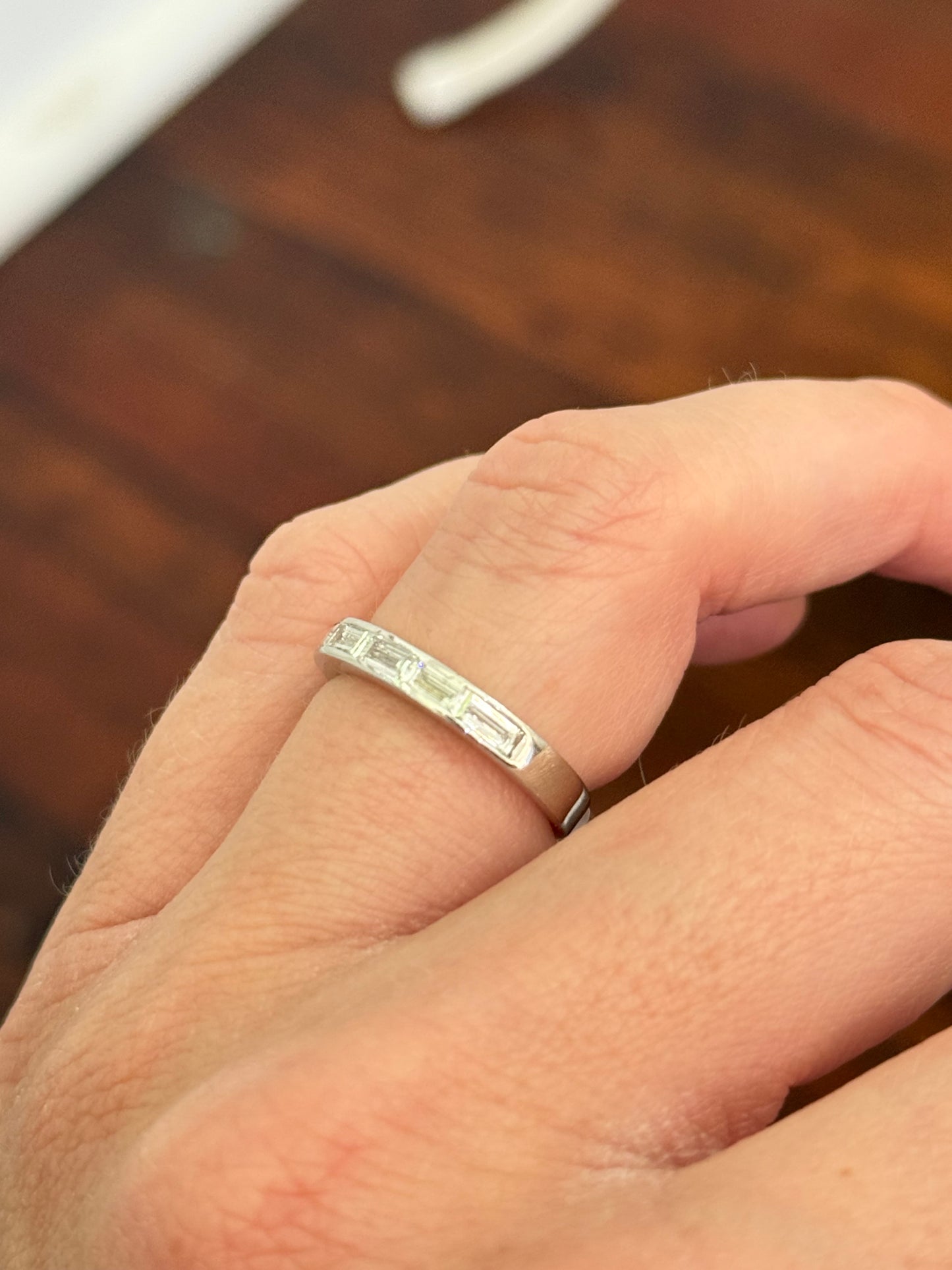 White gold east west set emerald cut lab diamond band