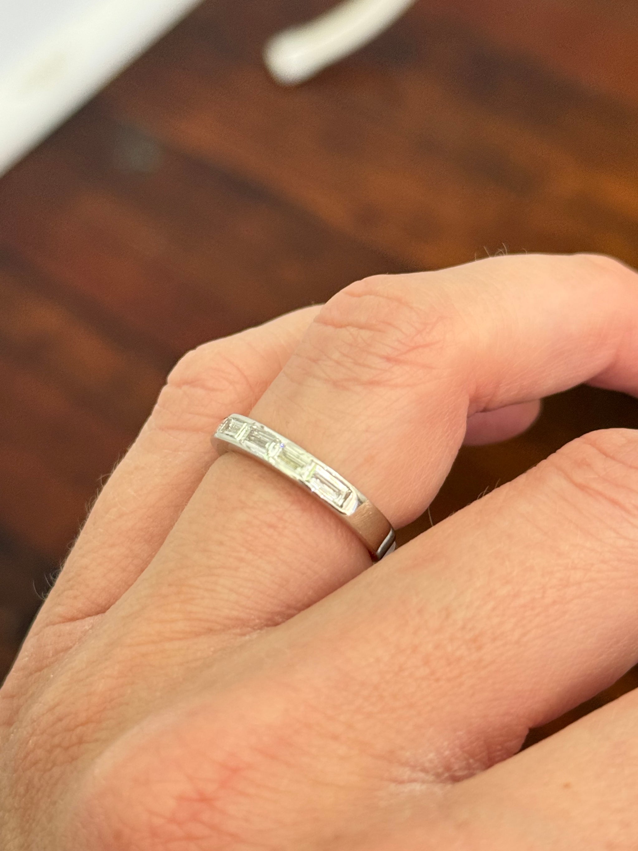 White gold east west set emerald cut lab diamond band