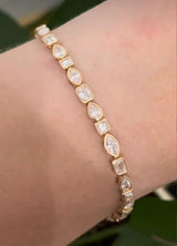 Yellow gold bezel set 5.3ct pear shape, marquise, princess and emerald cut natural diamond bracelet