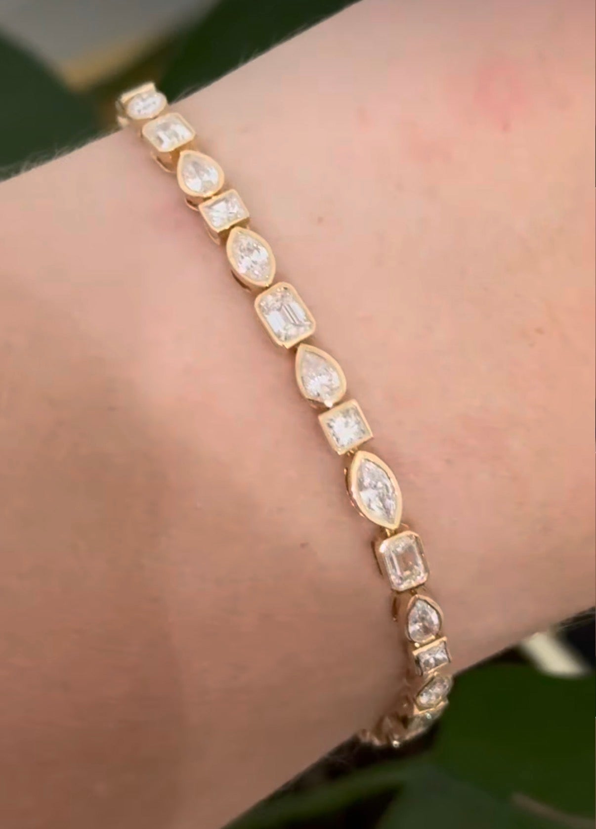 Yellow gold bezel set 5.3ct pear shape, marquise, princess and emerald cut natural diamond bracelet