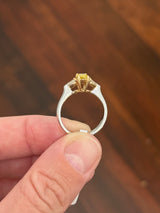 White gold cushion cut yellow lab diamond and pear shape white lab diamond ring. Lab diamonds set in yellow gold.