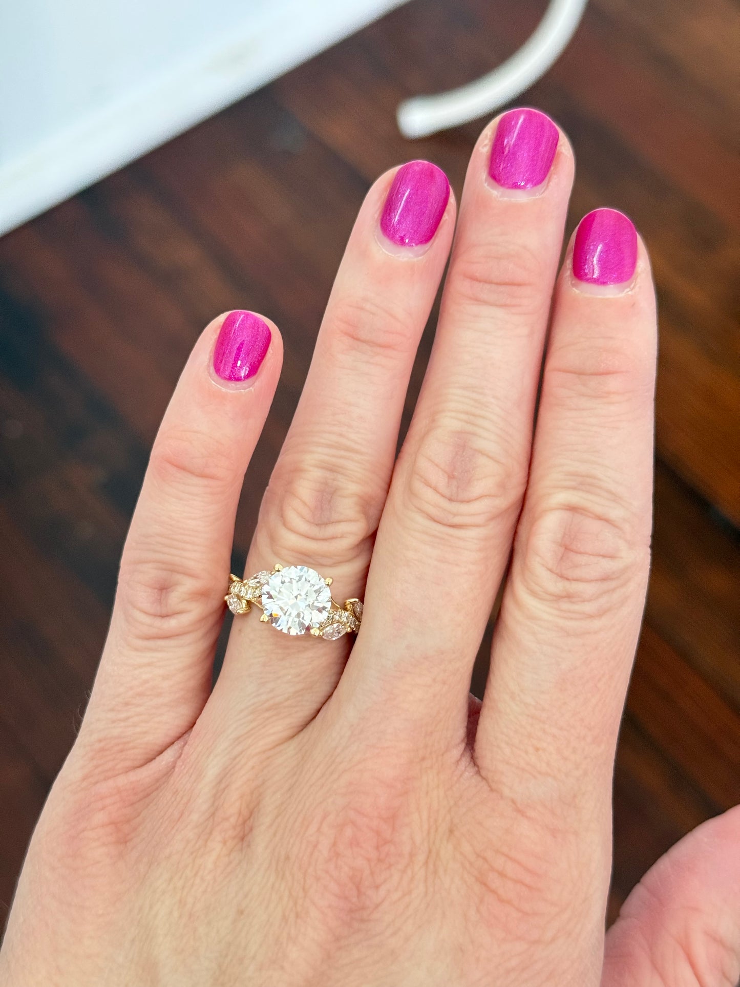 Yellow gold round and marquise lab diamond ring. Center stone is 3.05cts