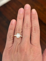 Yellow gold IGI certified emerald cut and tapered baguette lab diamond ring. Center stone is 3.03cts