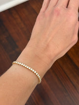 Yellow gold 4 prong 6.66ct natural diamond tennis bracelet