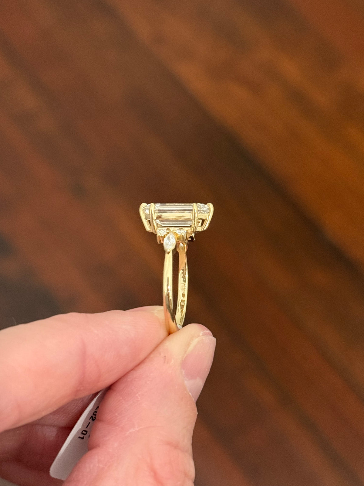 Yellow gold IGI certified 2.69ct step cut duchess cut lab diamond and marquise and round lab diamond ring. Duchess cut measures 12.69x6.28x4.05mm