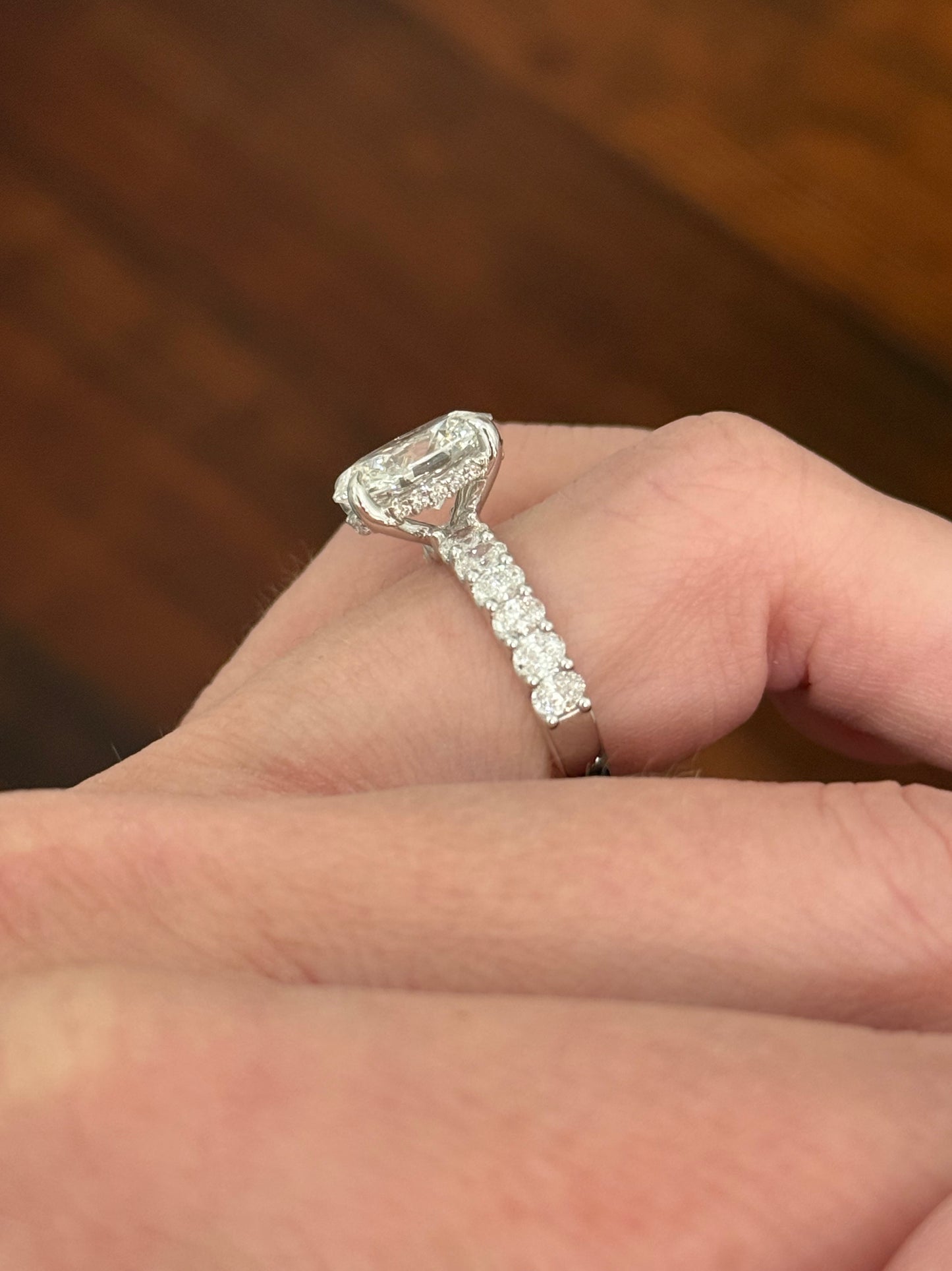 White gold oval lab diamond ring. Center stone is IGI certified and 3.07cts E VVS2