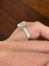 White gold oval lab diamond ring. Center stone is IGI certified and 3.07cts E VVS2