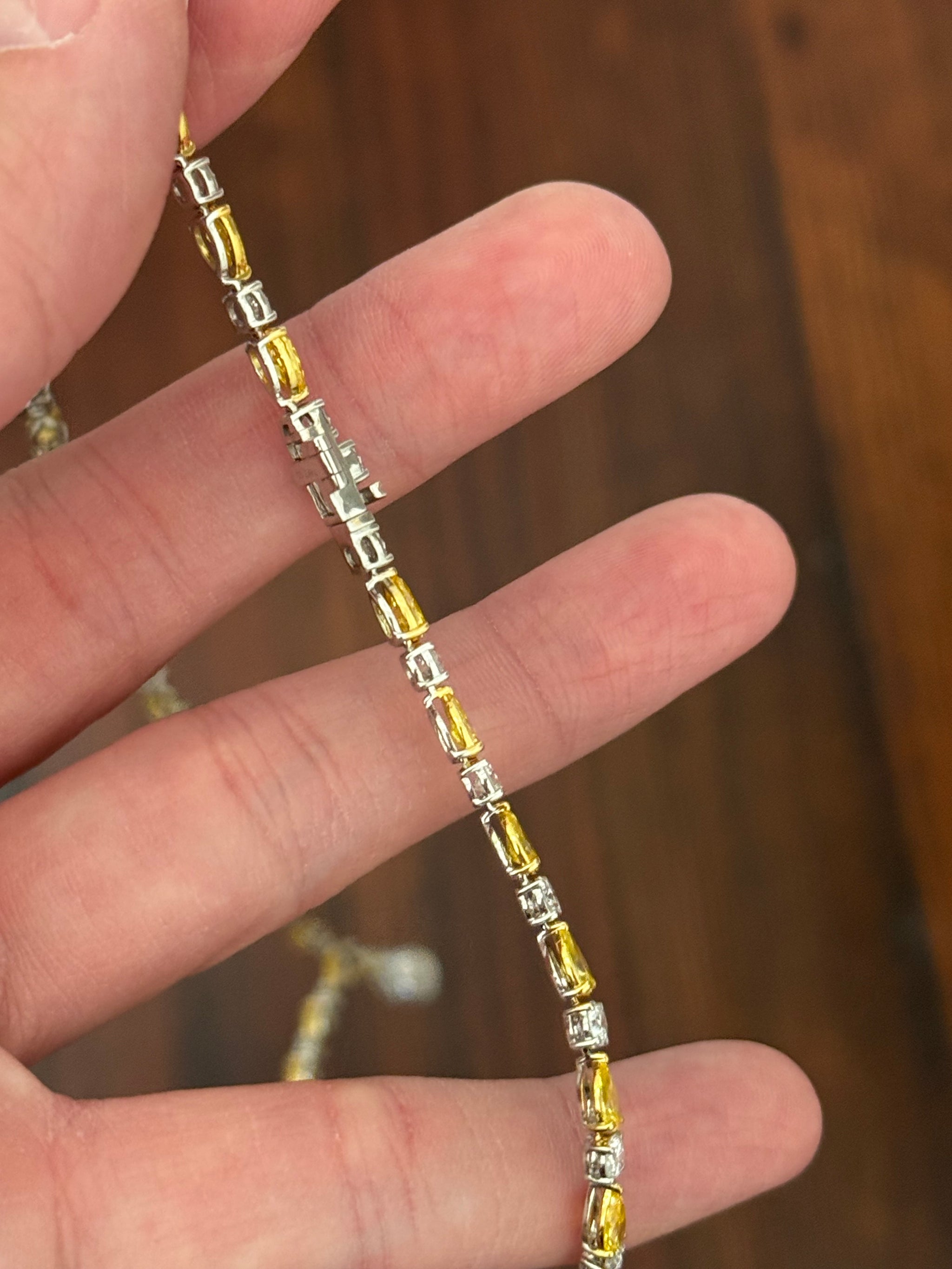 White gold pear shape yellow and white lab diamond and round white lab diamond necklace. Center stone is IGI certified and 1.86cts D VVS2