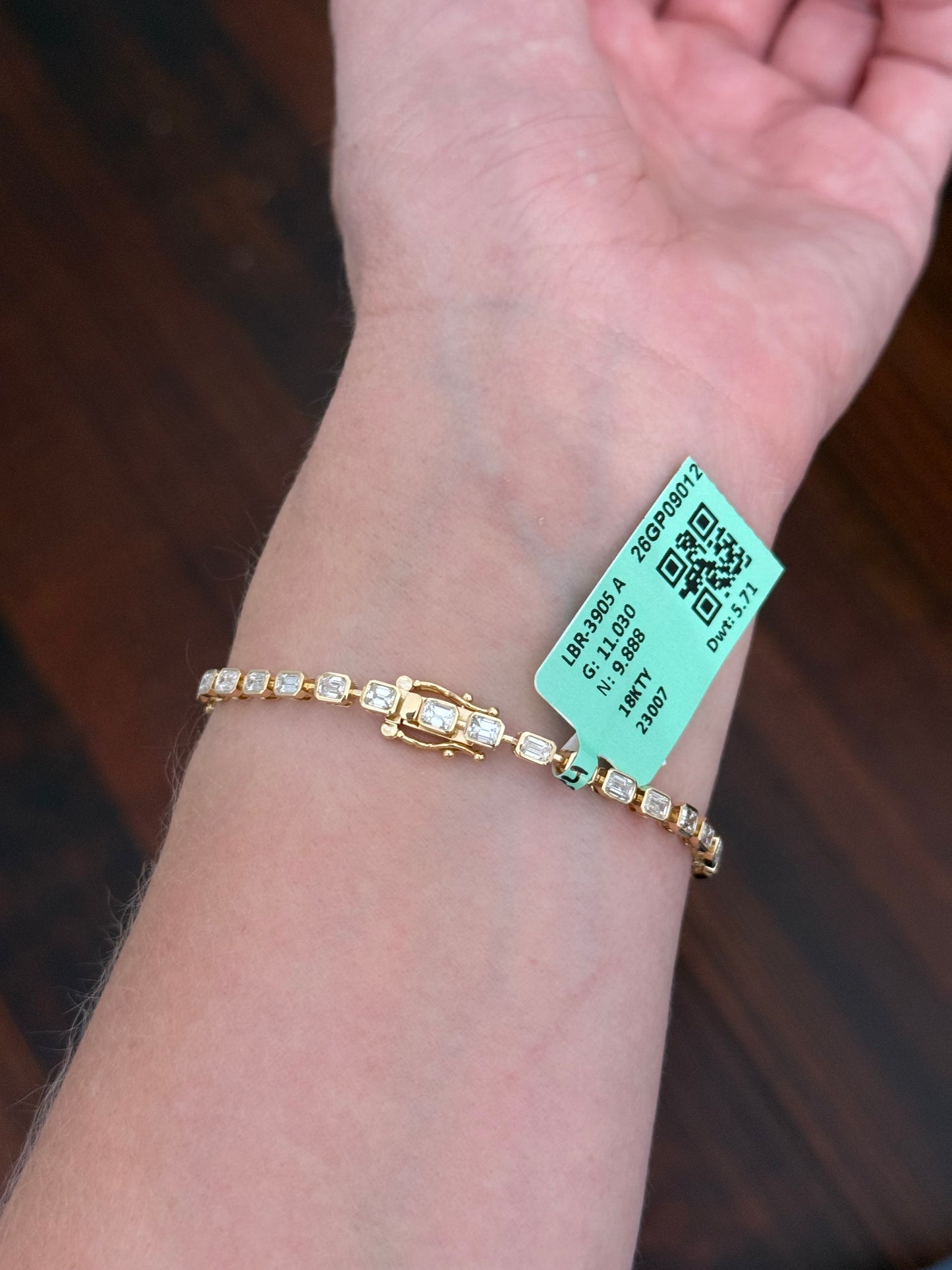 Yellow gold bezel set 5.71ct emerald cut natural diamond bracelet