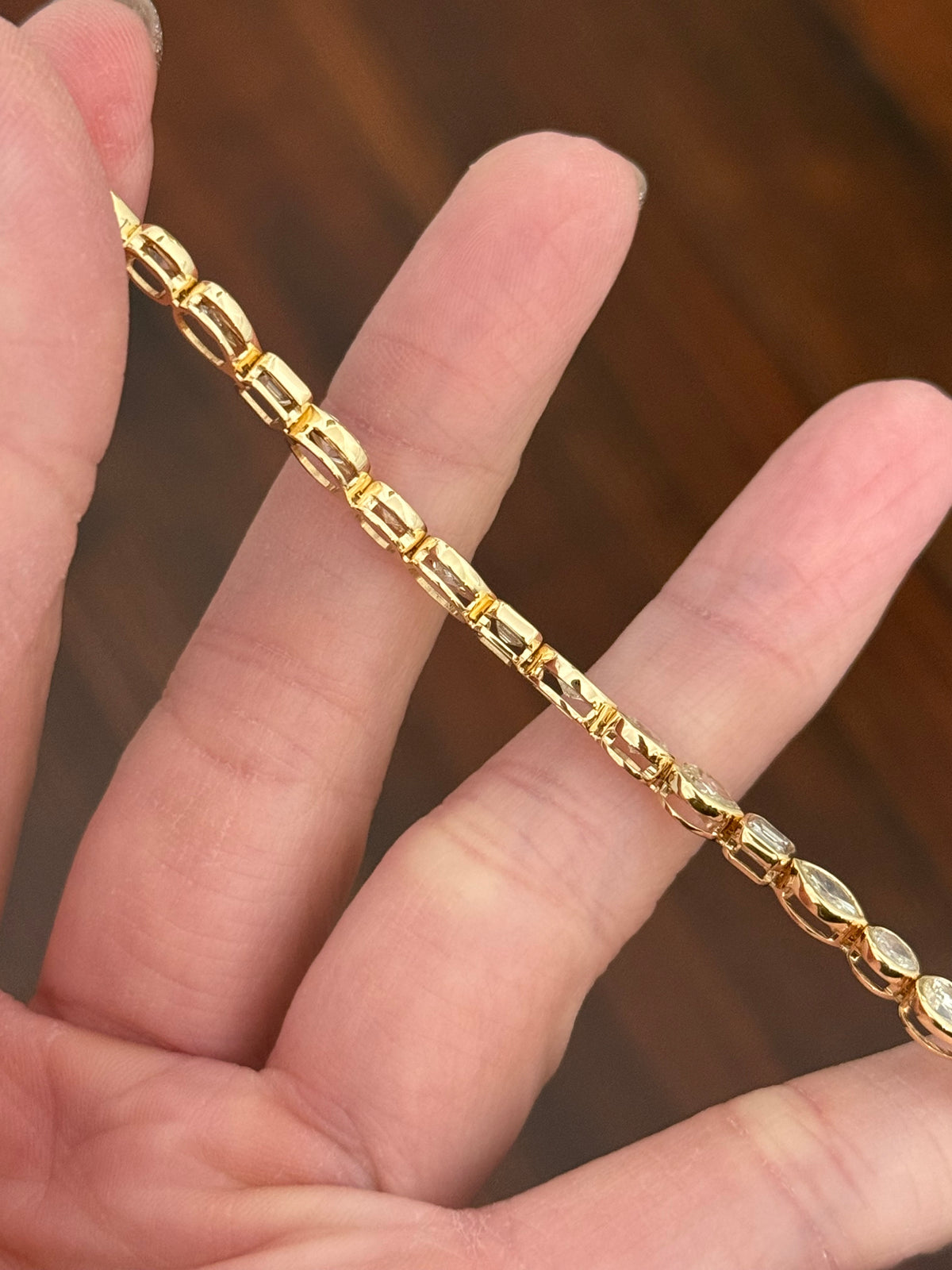 Yellow gold bezel set 7.58ct marquise, oval, emerald cut and pear shape natural diamond bracelet