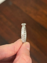 White gold 1.06ct round lab diamond and 4.14ct emerald cut lab diamond eternity ring