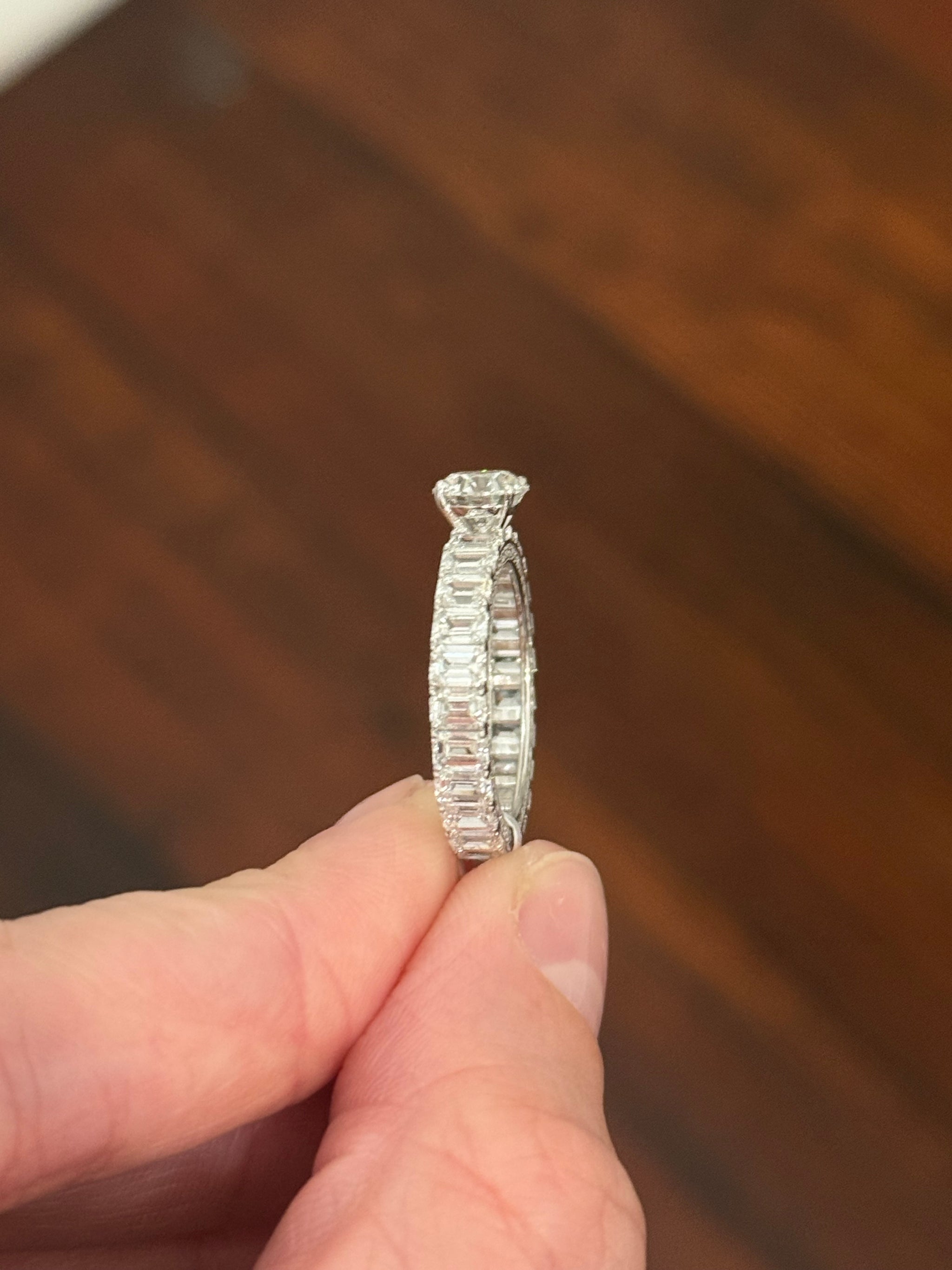 White gold 1.06ct round lab diamond and 4.14ct emerald cut lab diamond eternity ring