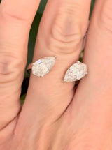 White gold 3.15ct step cut pear shape lab diamond bypass ring. Each measures 10.45x5.70mm