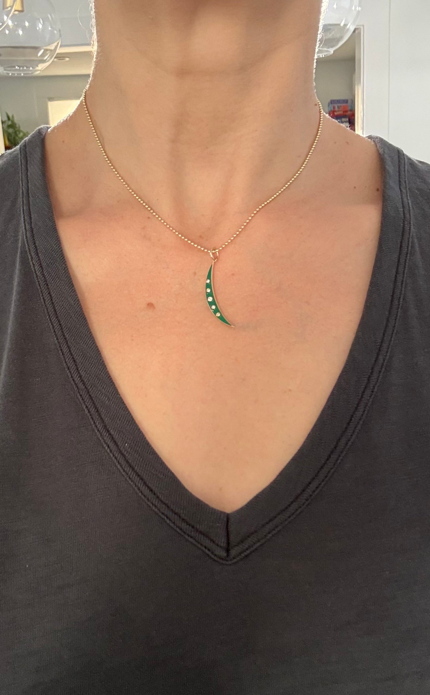 Yellow gold natural diamond and enamel crescent pendants