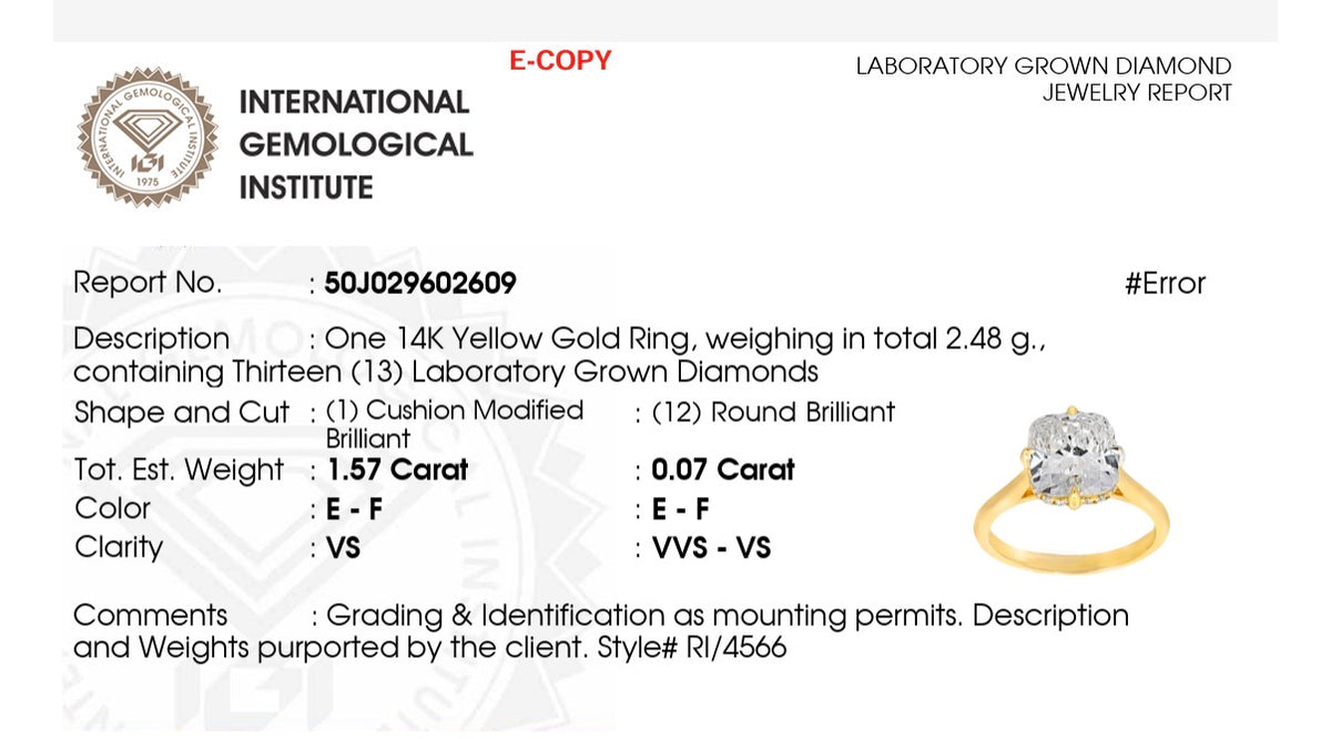 IGI certified yellow gold cushion and round lab diamond ring. Center stone is 1.57cts