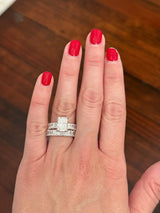 White gold radiant lab diamond ring. Center stone is IGI certified and 3.09cts E VVS2