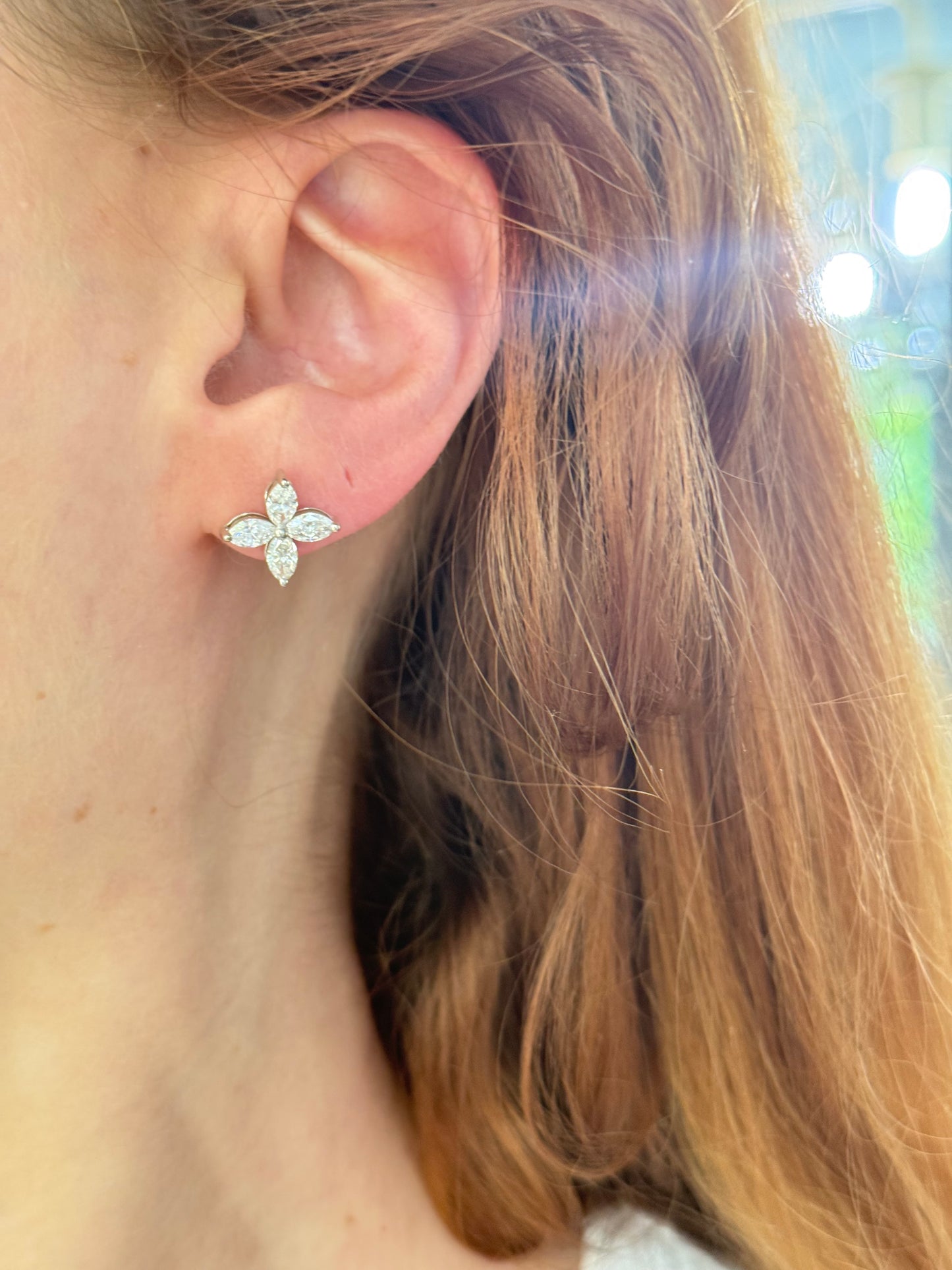 White gold flower stud earrings with marquise lab diamonds and push backs