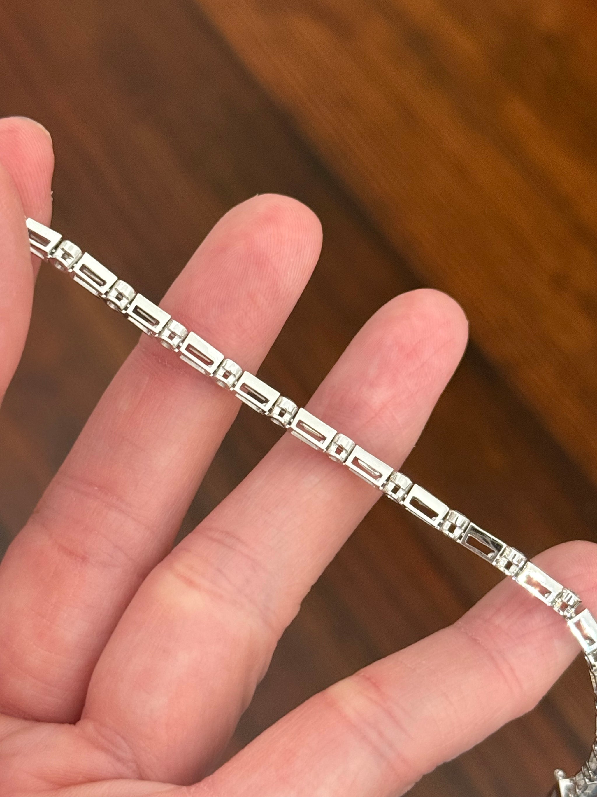 White gold bezel set 4.22ct tapered baguette and round natural diamond bracelet