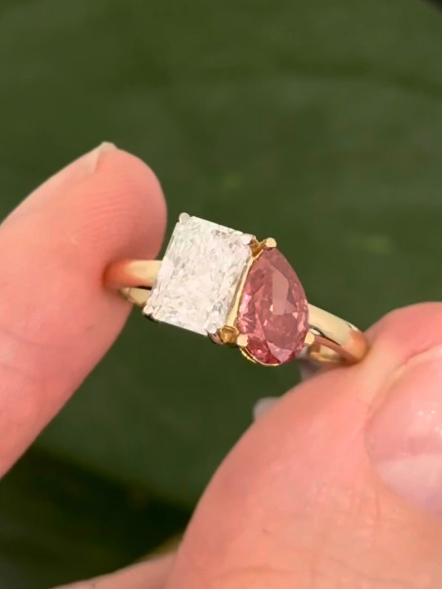 Yellow gold pear shape pink lab diamond and radiant white lab diamond ring