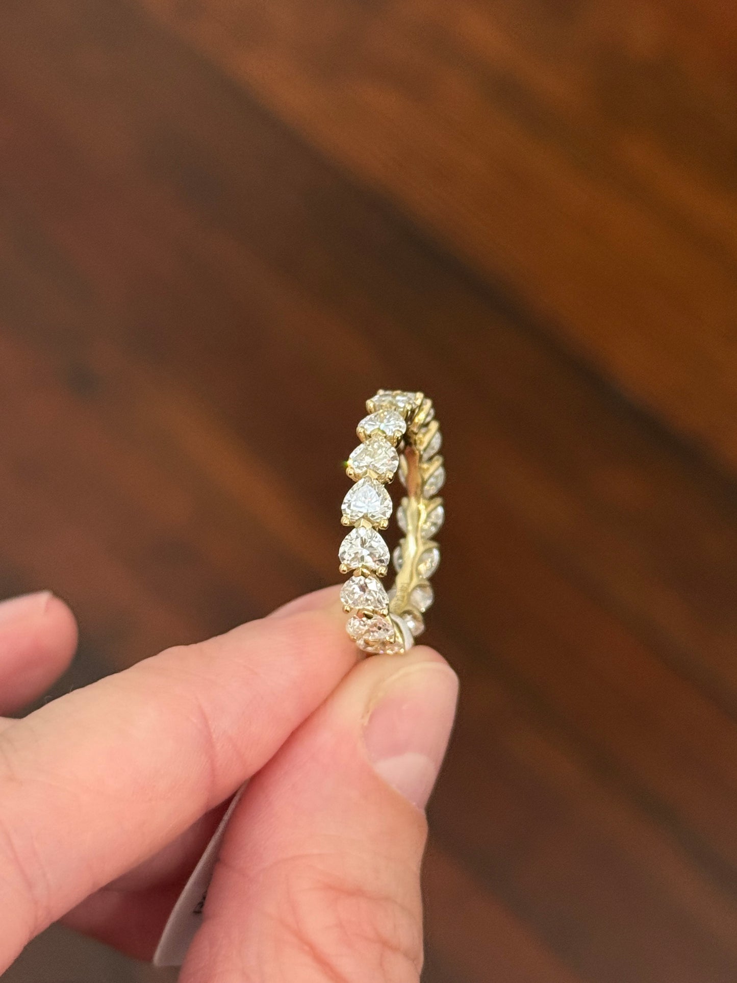 Yellow gold 4.49ct heart shaped lab diamond eternity band