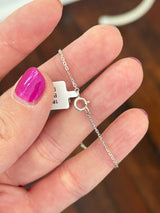 Heart chain bracelets with baguette and round diamonds available in yellow and white gold