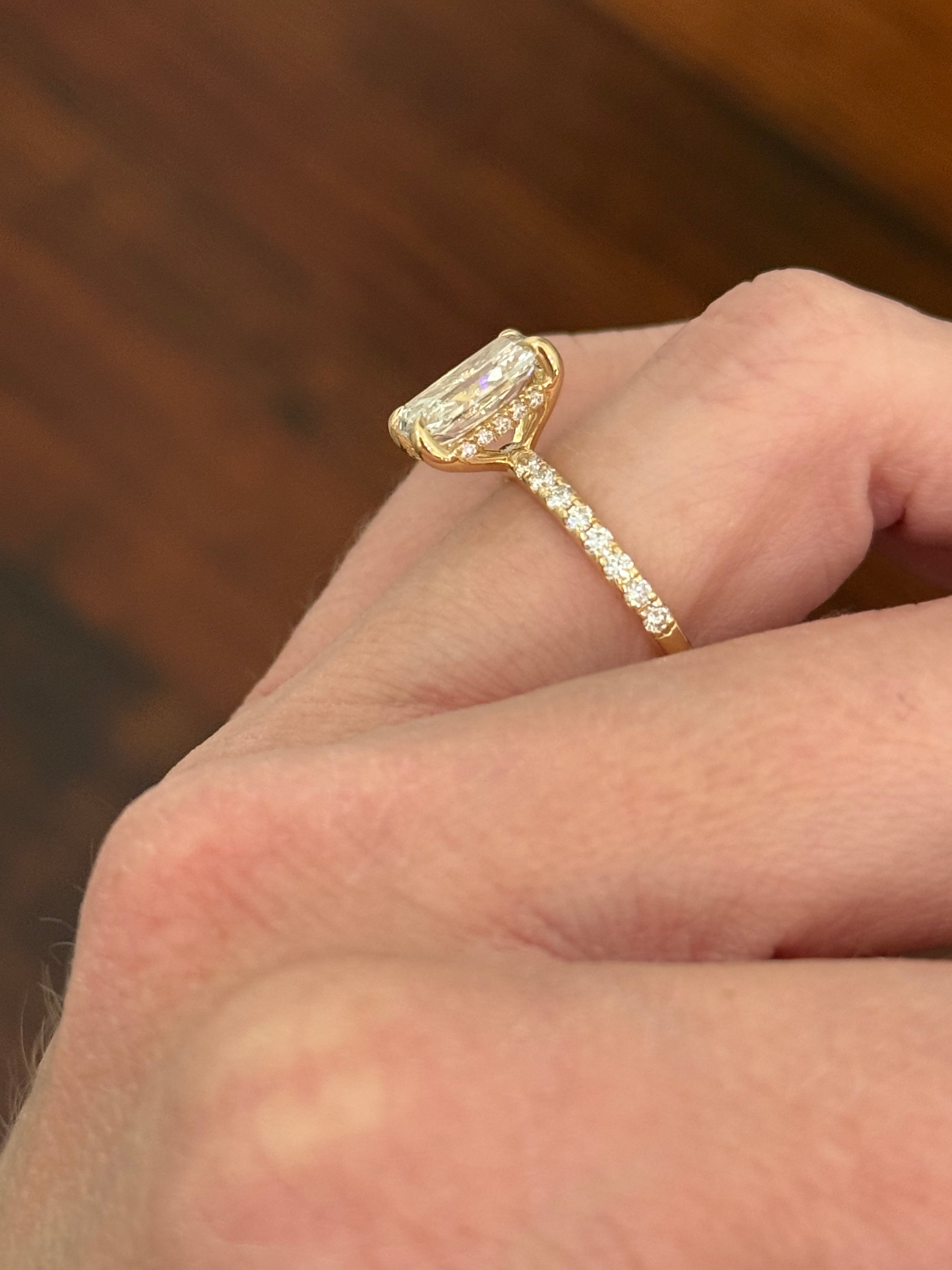 Yellow gold radiant lab diamond ring. Center stone is IGI certified and 3.0cts E VS1