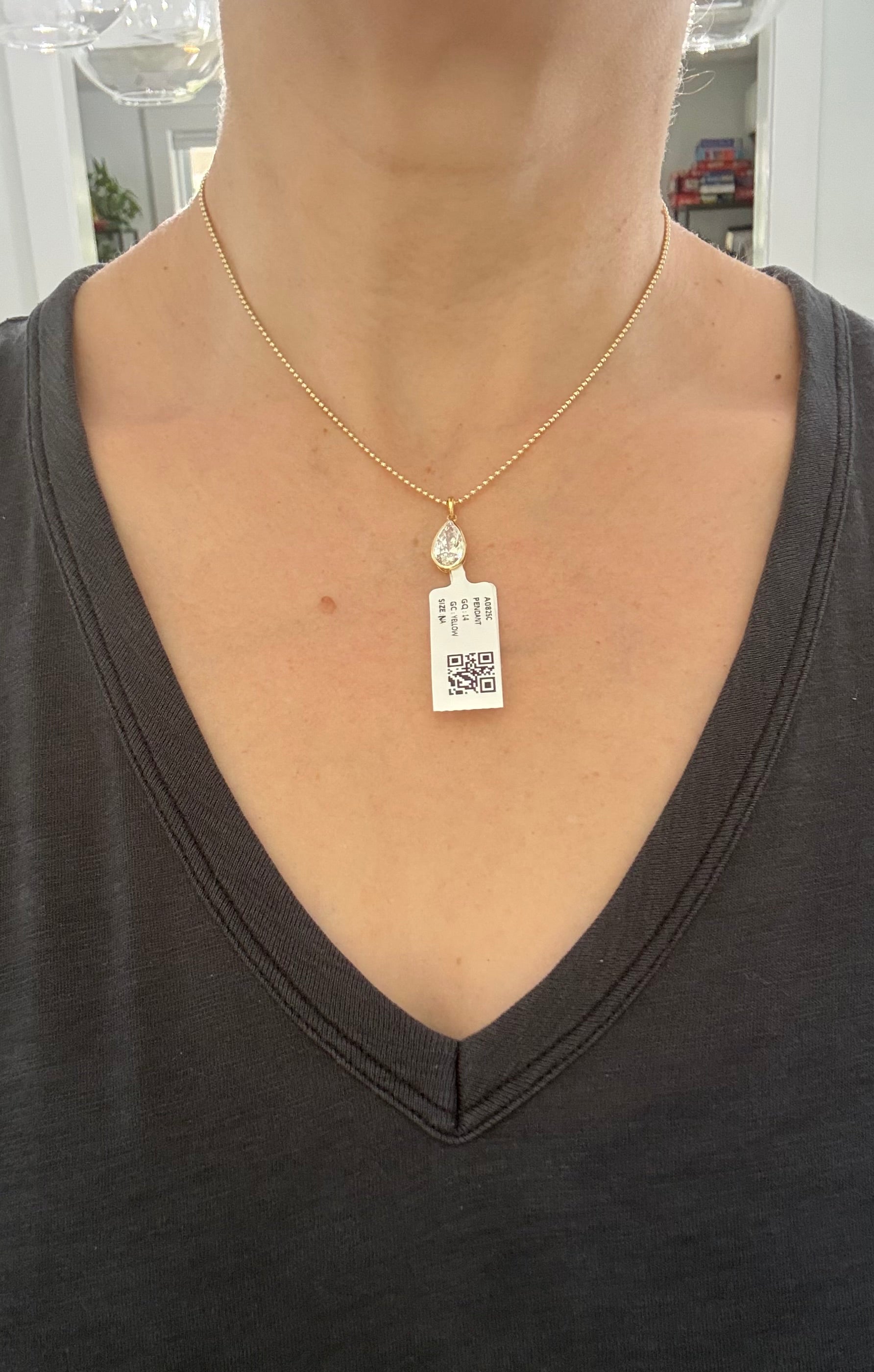 Yellow gold bezel set 2.01ct pear shaped lab diamond pendant