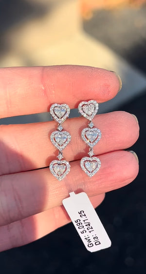 White gold diamond heart shaped dangling earrings natural