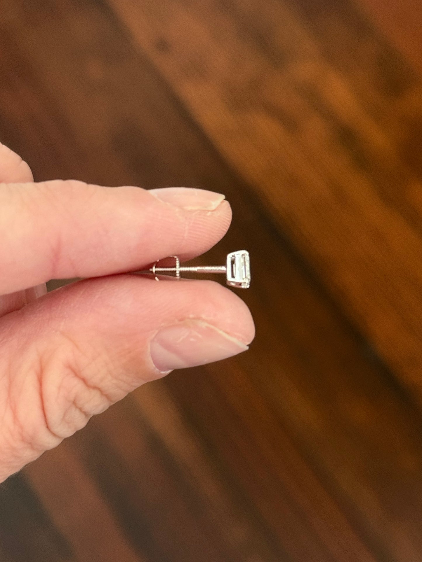 White gold 0.70ct emerald cut lab diamond stud earrings with screw backs