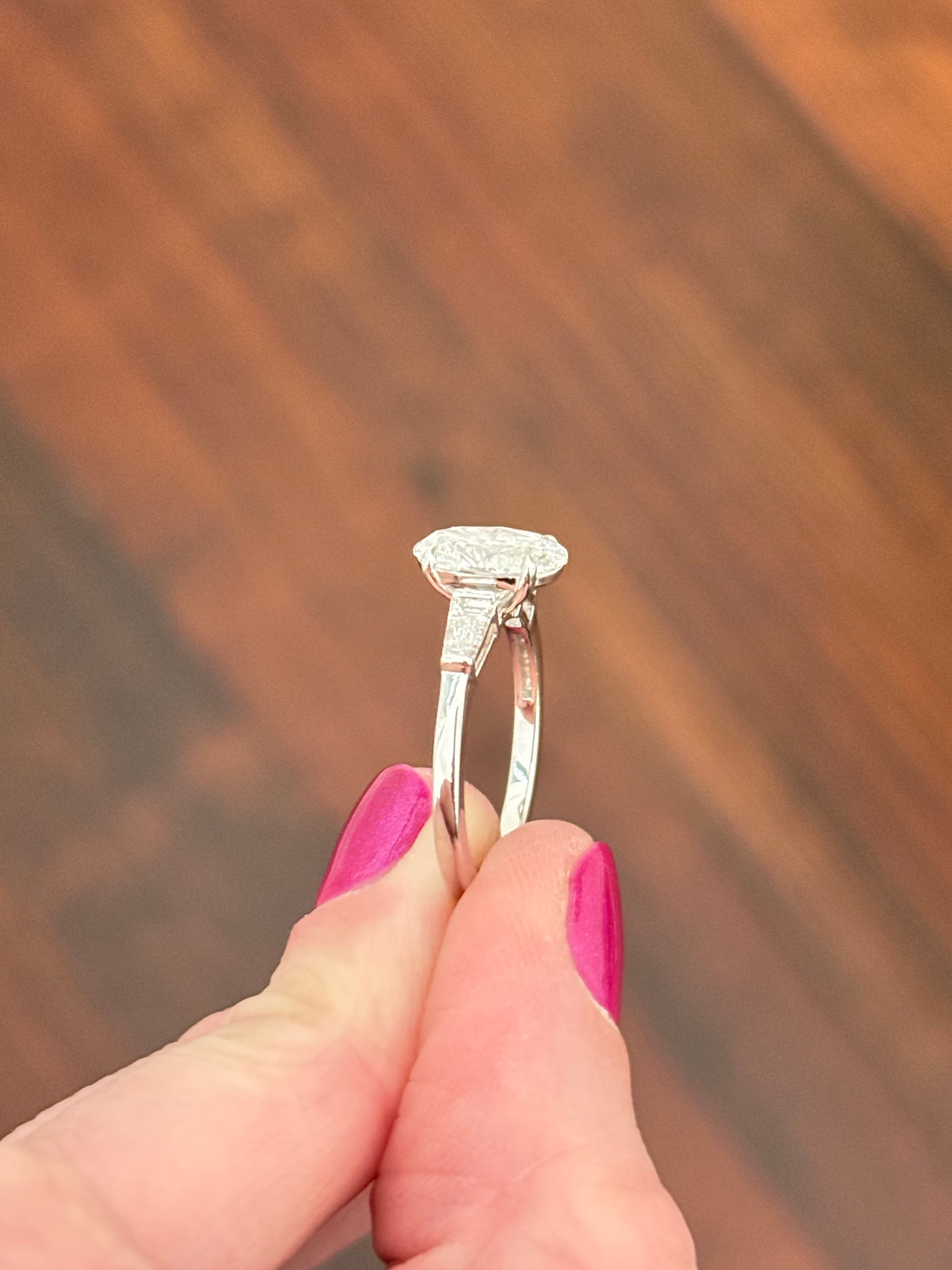 White gold IGI certified 2ct oval and tapered baguette lab diamond ring