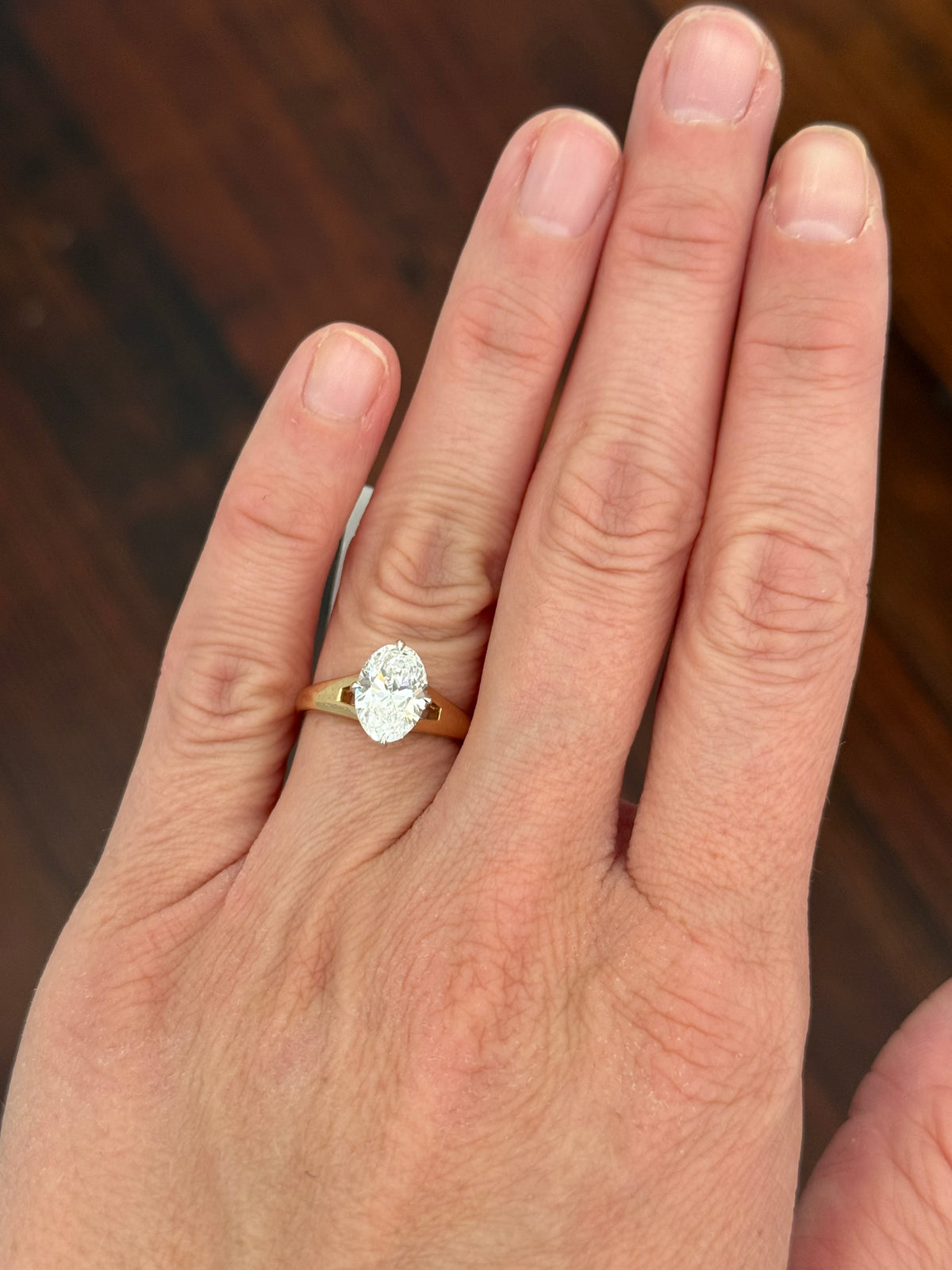 IGI certified oval lab diamond ring. Center stone is 1.99cts