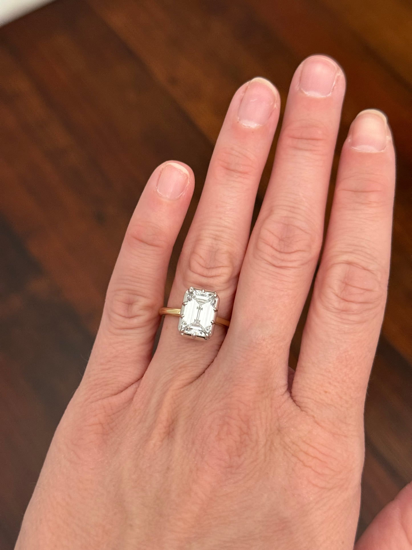 Georgian set IGI certified 4.11ct emerald cut lab diamond ring. Lab diamond is set in white gold and band is yellow gold
