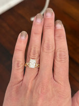 Yellow gold radiant and marquise lab diamond ring. Center stone is 3.07cts E VS1 and measures 9.8x6.7mm