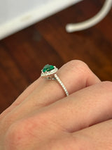White gold heart shaped lab emerald and round lab diamond ring