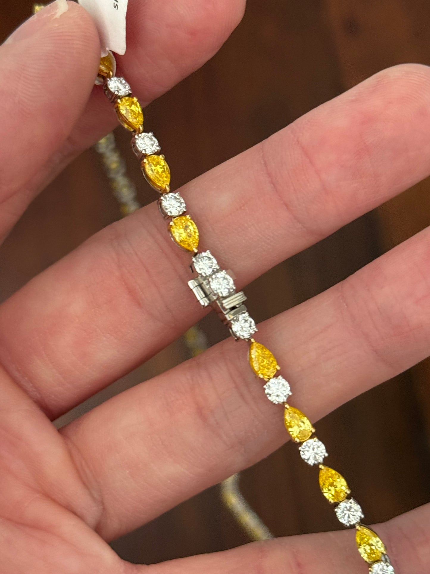 White gold pear shape yellow and white lab diamond and round white lab diamond necklace. Center stone is IGI certified and 1.86cts D VVS2